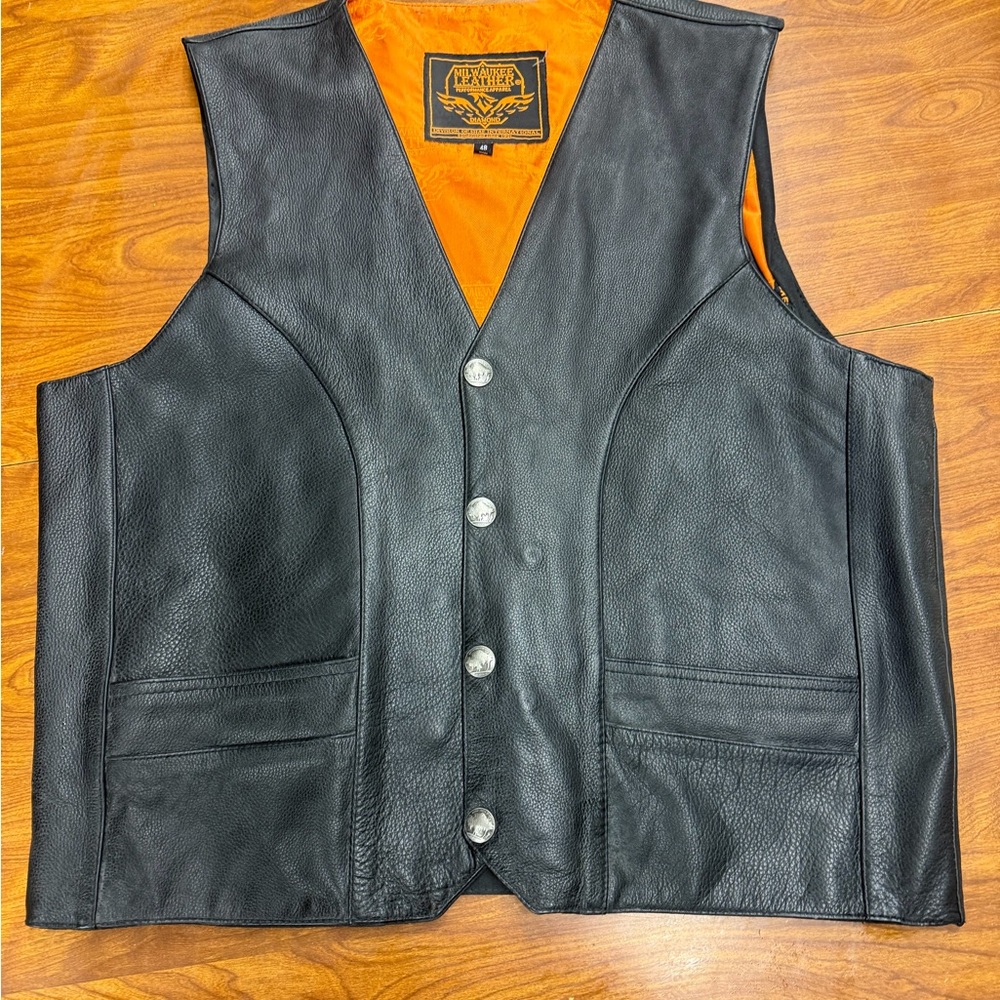 Sleek Black Leather Vest with Vibrant Orange Lining